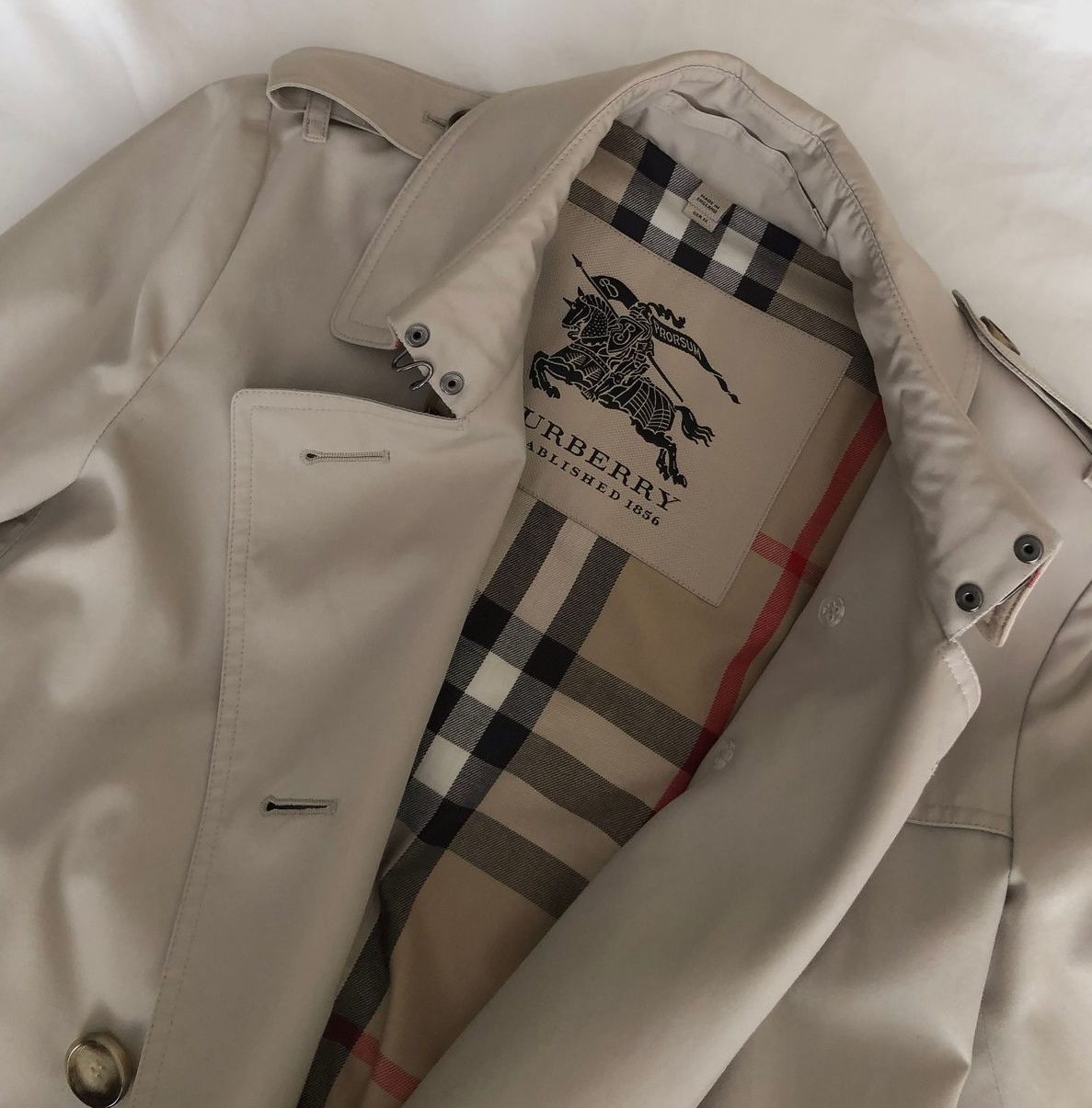 Burberry rebrand, the trench's check lining and Equestrian Knight label